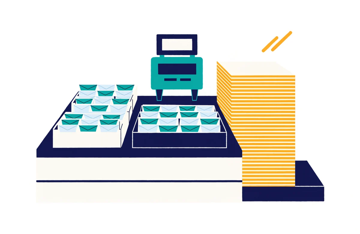 A sorting table with trays of envelopes, a postage meter and a tall stack of cards.